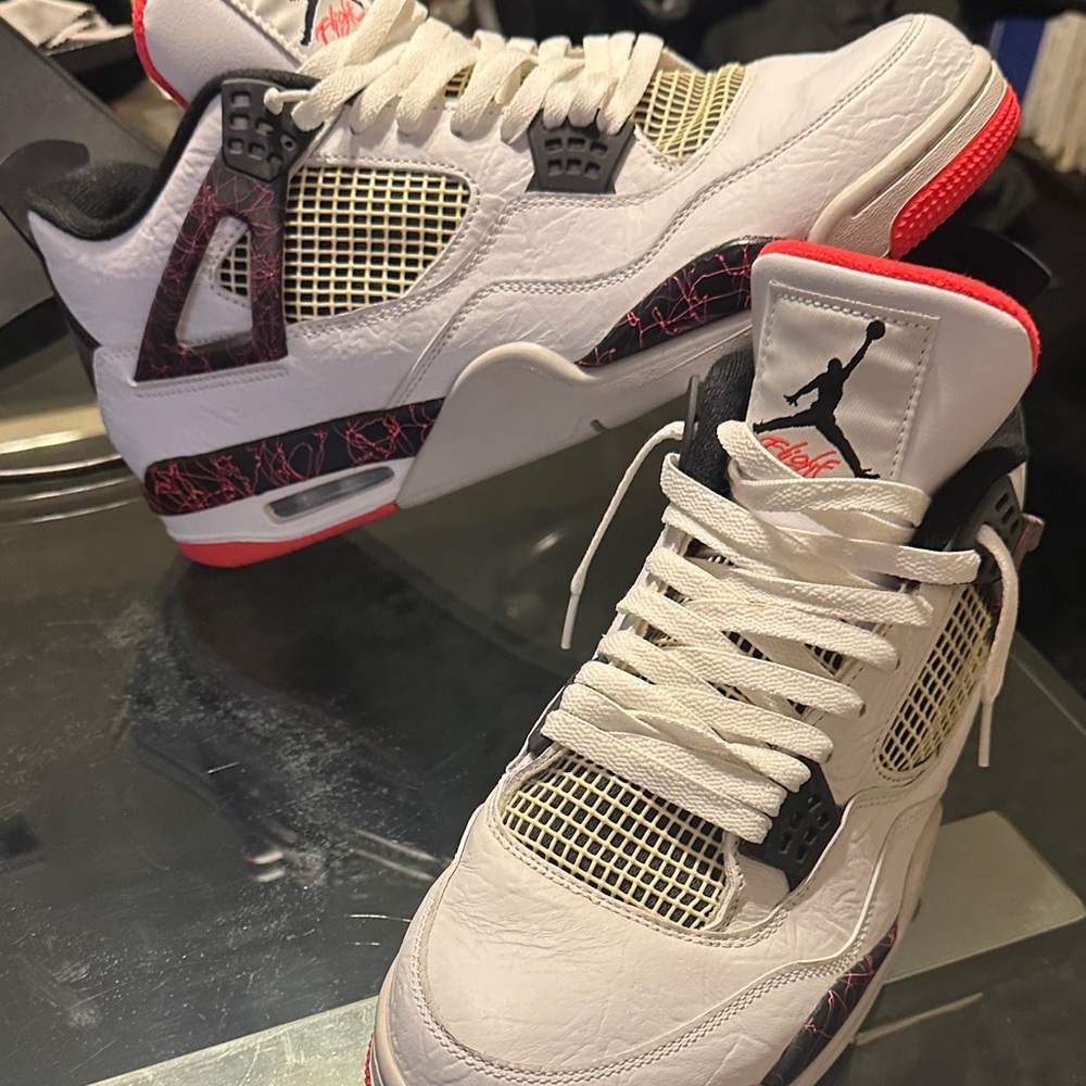 Jordan Retro 4 Rare White and Black Sneakers with Red Accents